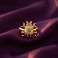 Gold crystal beetle ring with sparkling scarab design on plum satin – quirky statement ring by Style With Anjaly