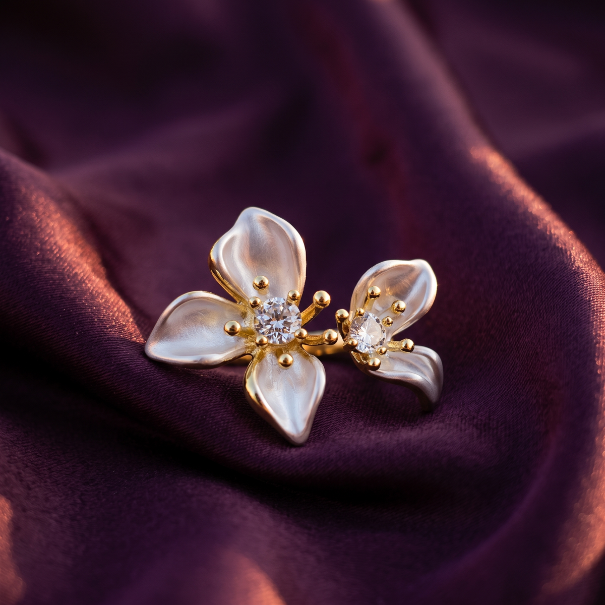 Gold twin lily flower open ring with pearly white petals and crystal centres on plum satin – adjustable statement ring by Style With Anjaly