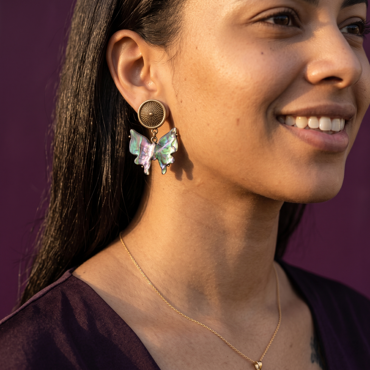 Side view of iridescent multicolour butterfly dangle earring on ear – antique gold stud statement earrings, perfect gift for her